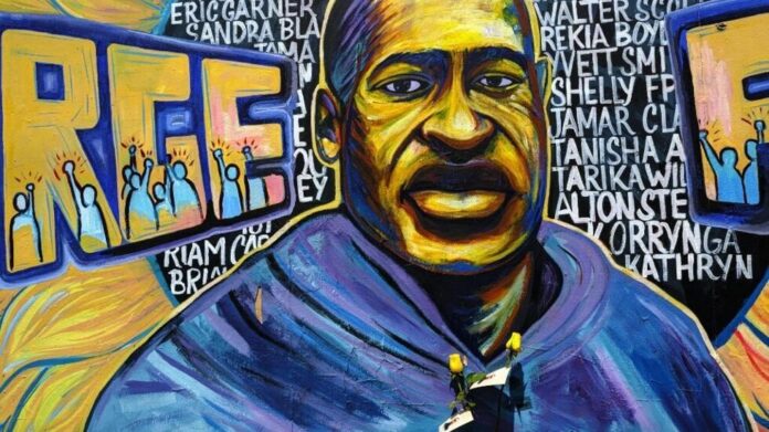 Une fresque à l'effigie de George Floyd à Minneapolis, lors d'une cérémonie d'hommage le 23 mai 2025. AFP - KEREM YUCEL